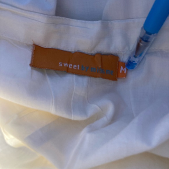 Sweet by Miss Me M
Beaded Cotton Skirt
Ivory Sparkle Sexy Elegant. - Picture 6 of 6